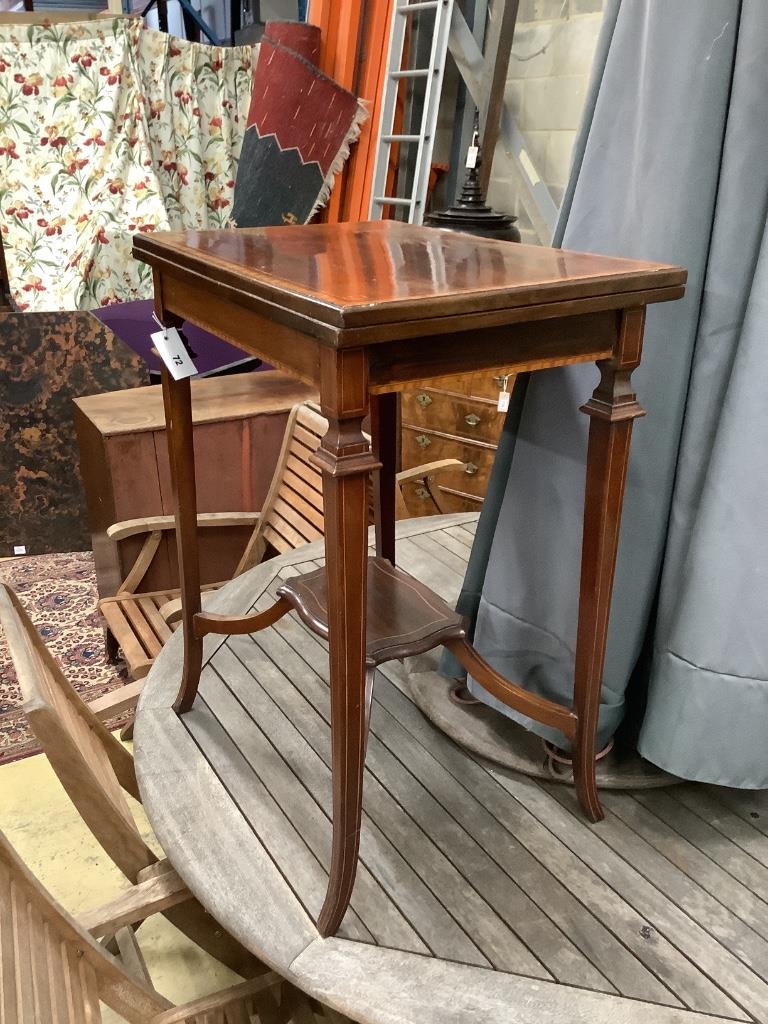 An Edwardian mahogany and satinwood banded swivel top card table, width 60cm, depth 40cm, height 74cm